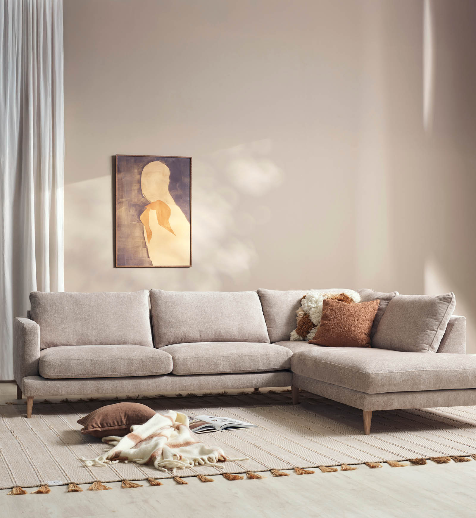 Beige soffa med öppet avslut