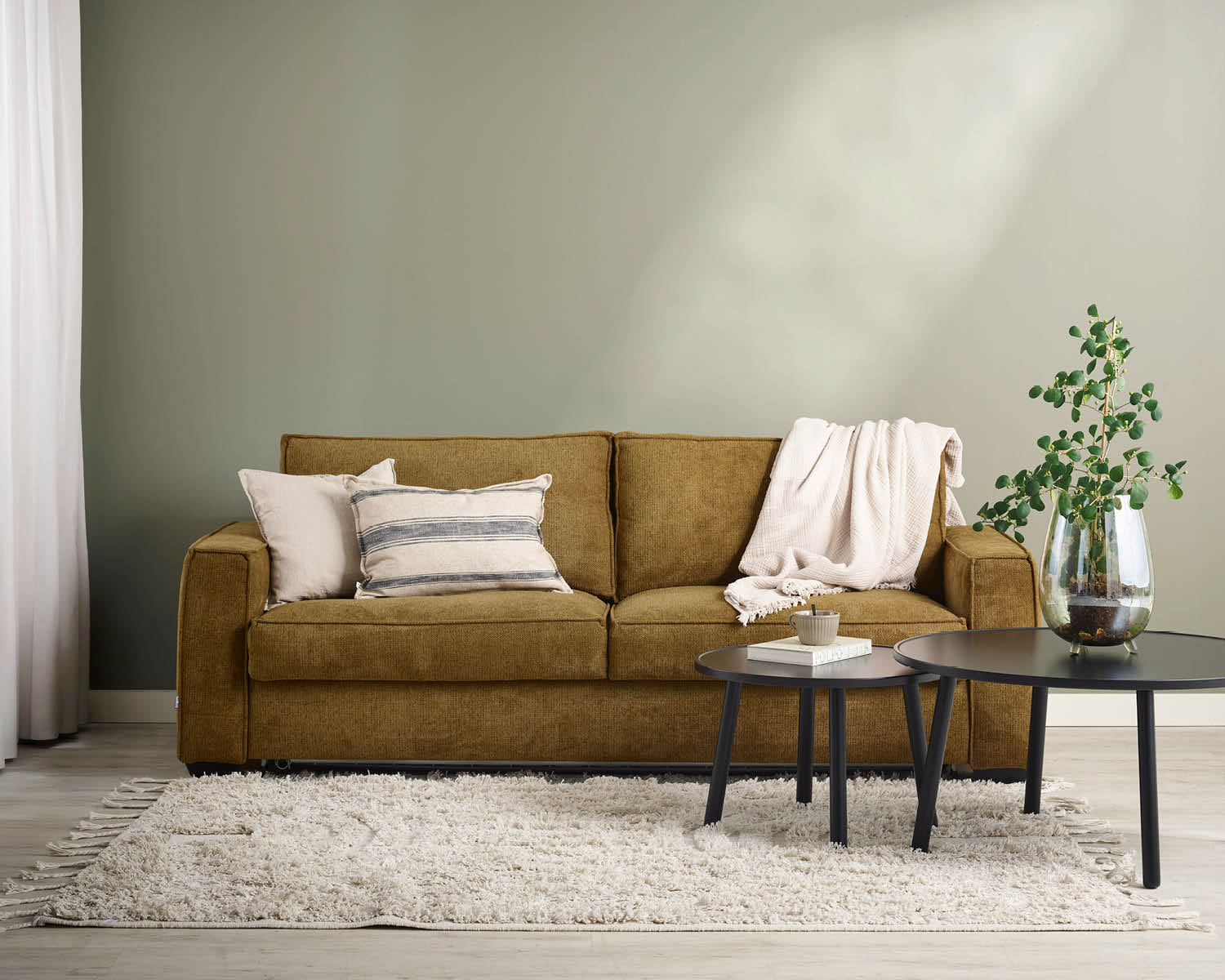 Senapsfärgad bäddsoffa gul